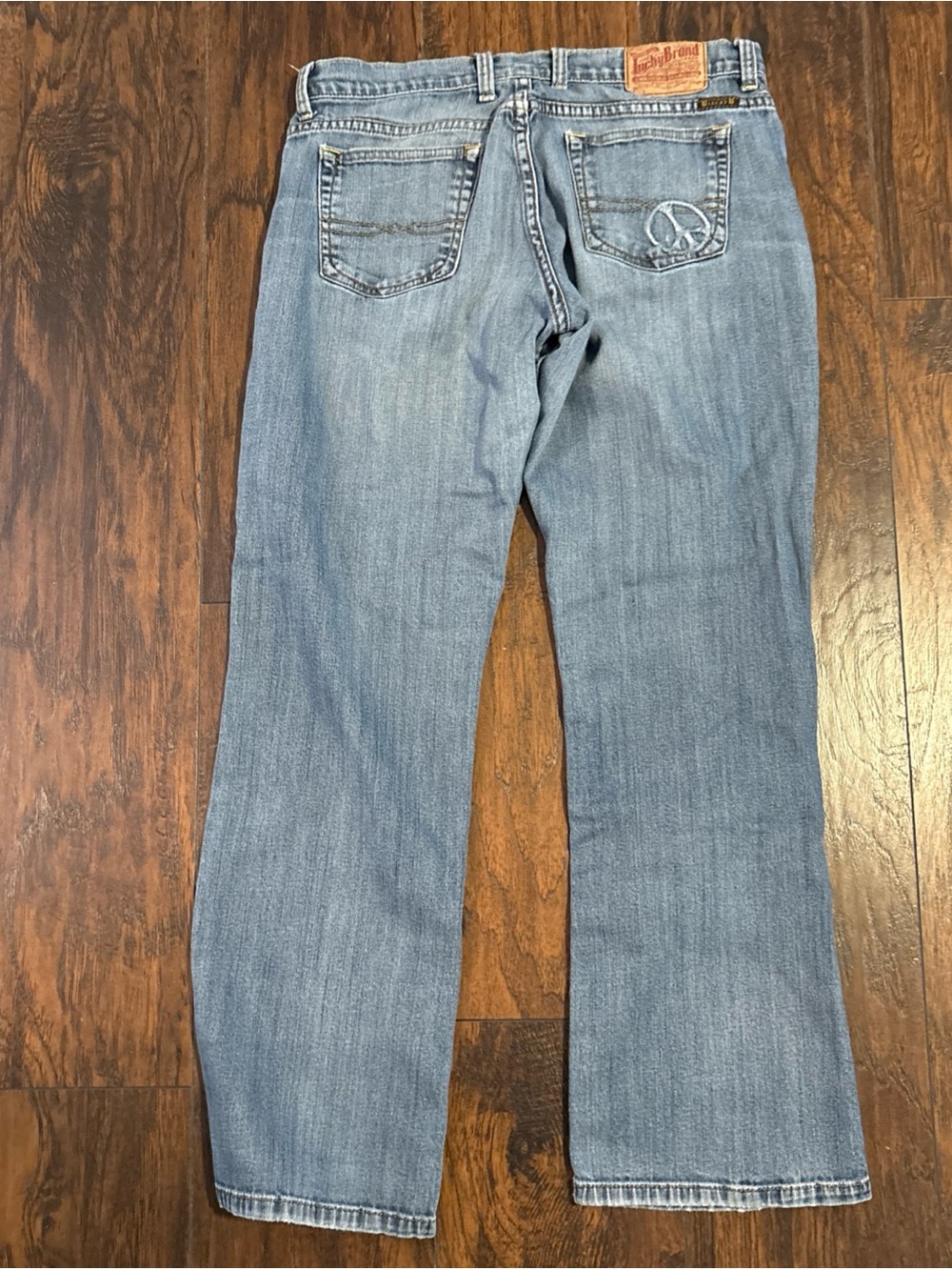 Lucky jeans Women's Light Blue Peace Sign Straight-Leg boot cut low rise size 8